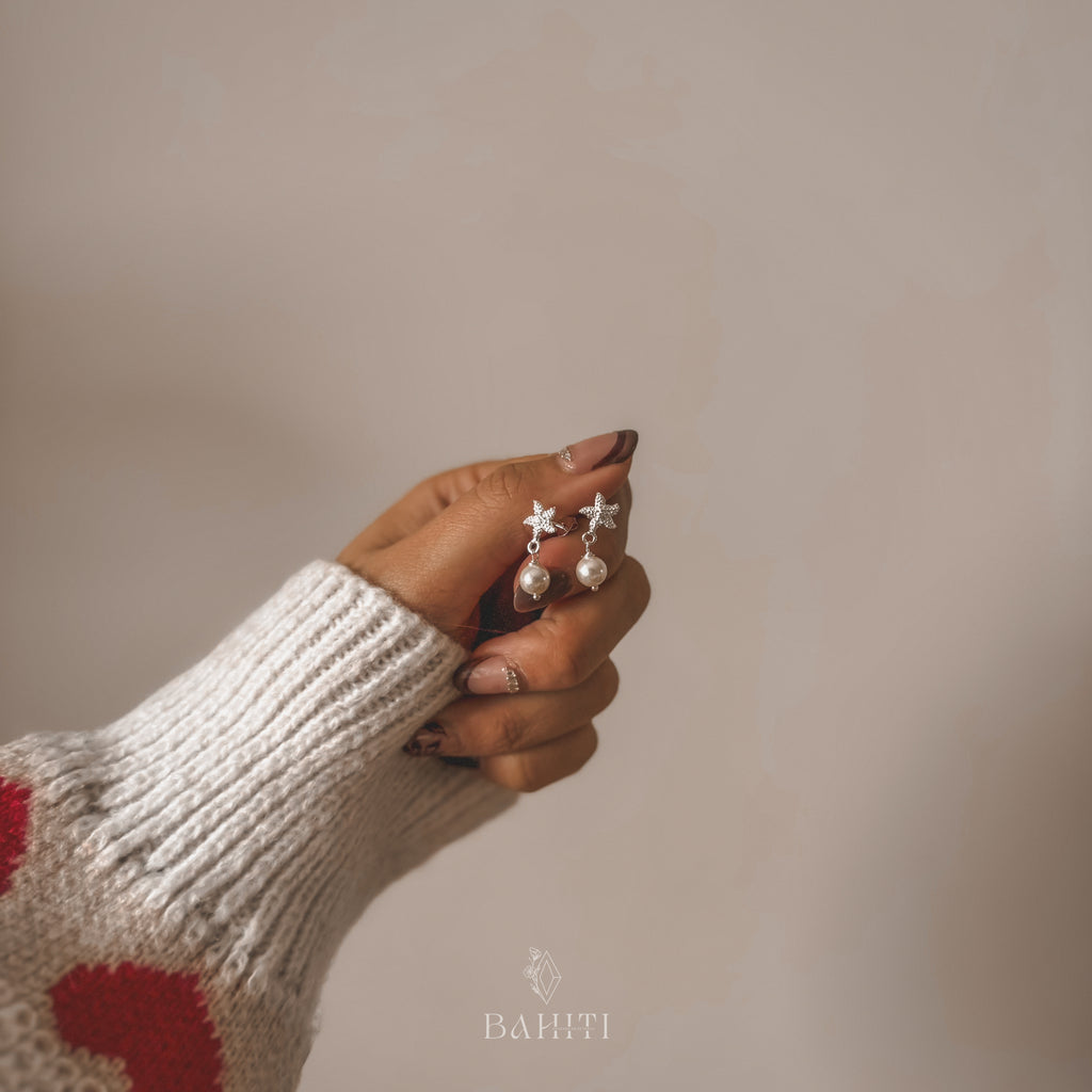 Aro estrella de mar con perla