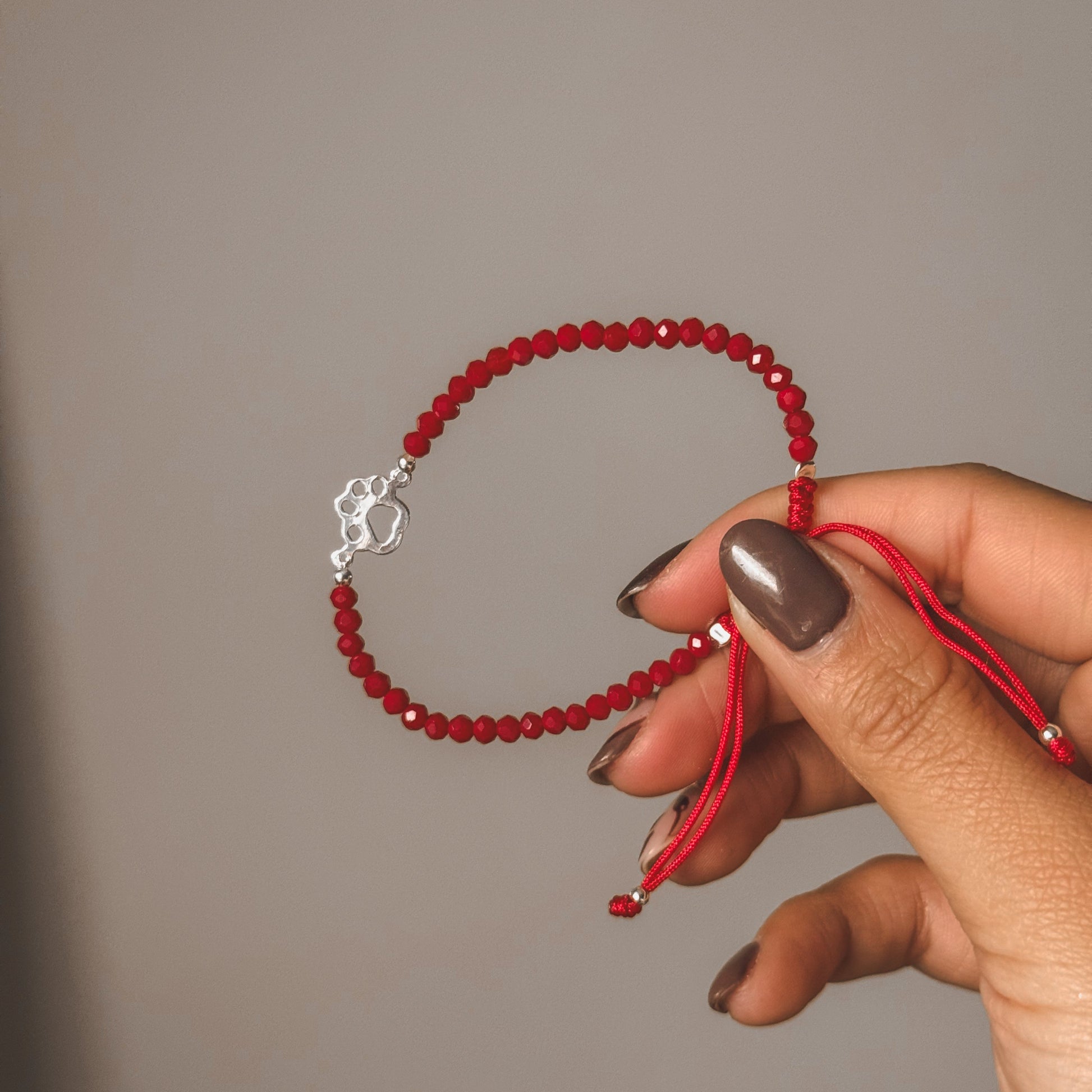 Pulsera roja Huella